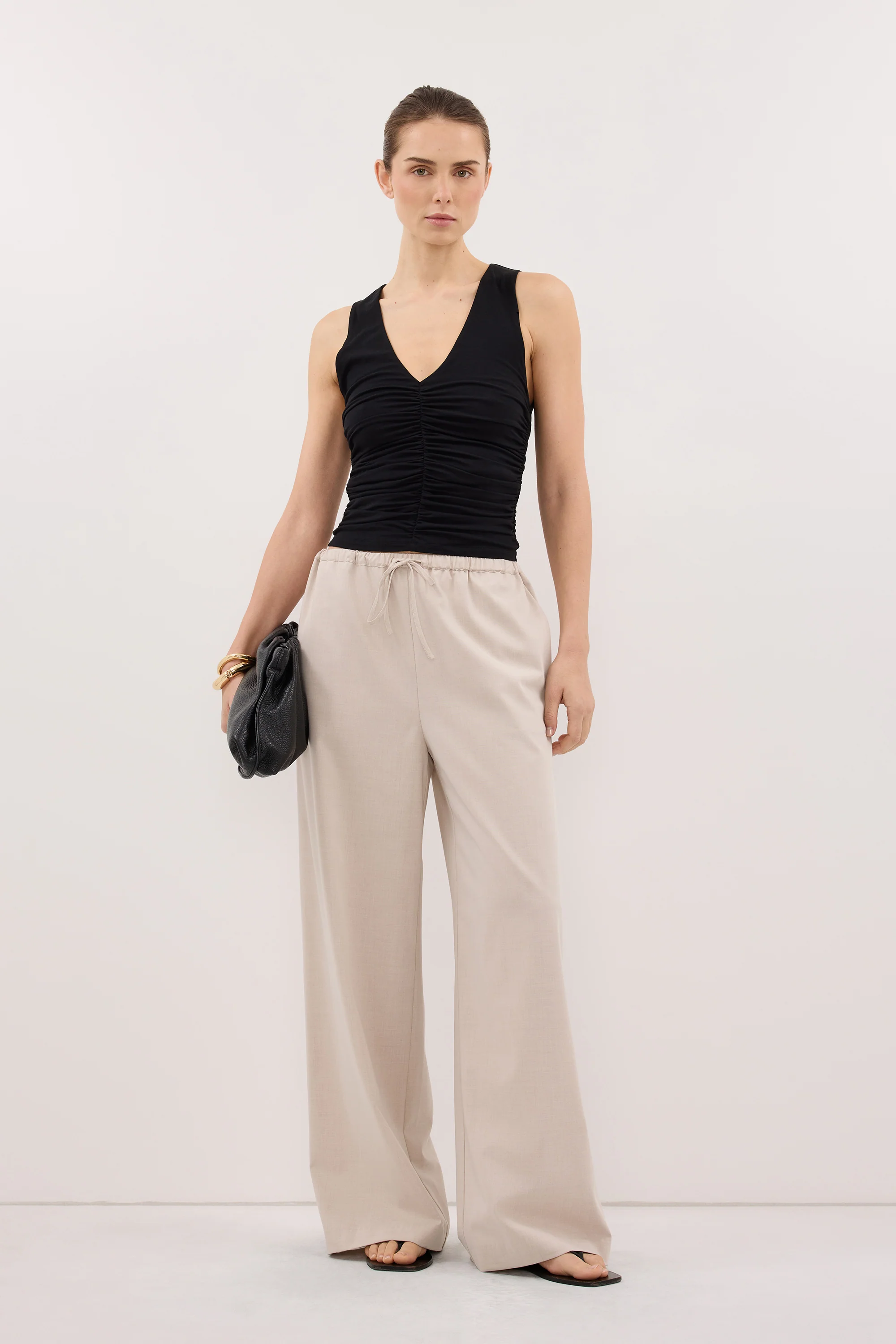 AVELIN BLACK RUCHED V NECK KNIT TOP
